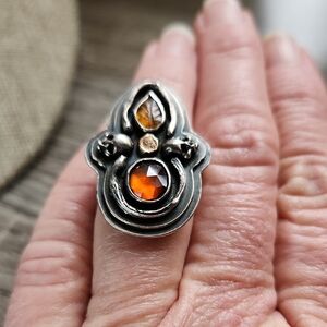 Artisan Silver Ring with Garnet And Tourmaline Gemstones, Skulls And Branches.
